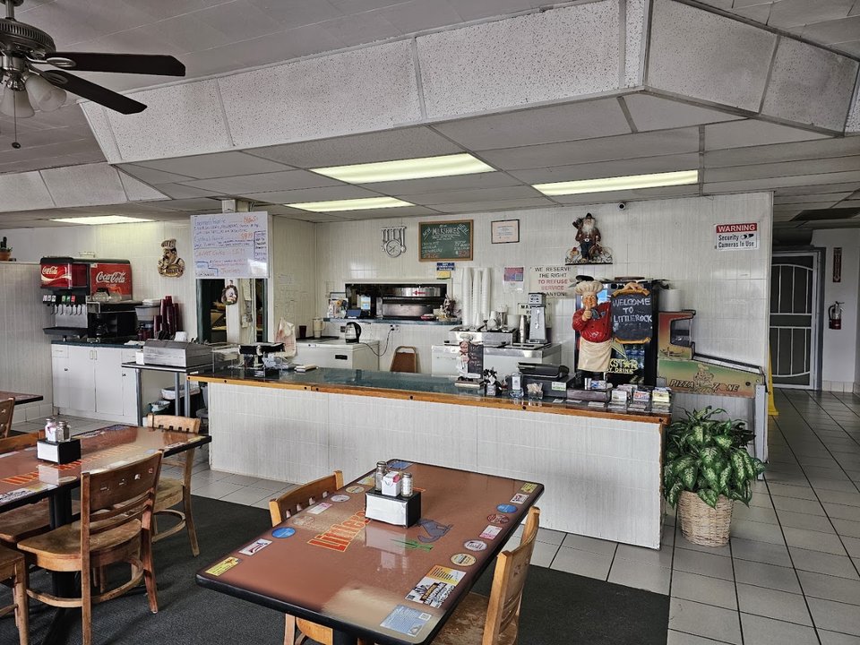 Family restaurant dining area with quiet lighting.