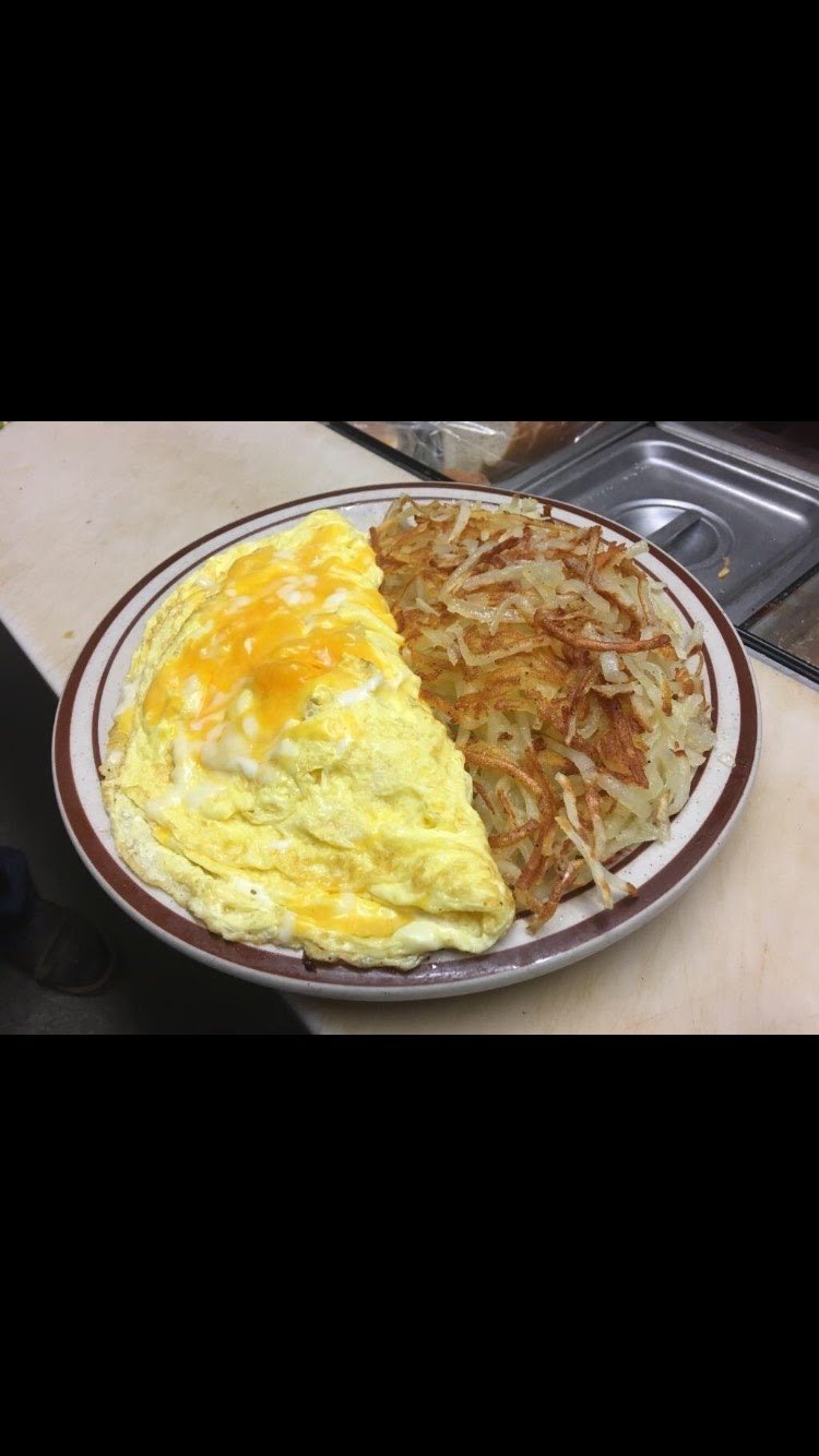 Menu page with breakfast and lunch sections.