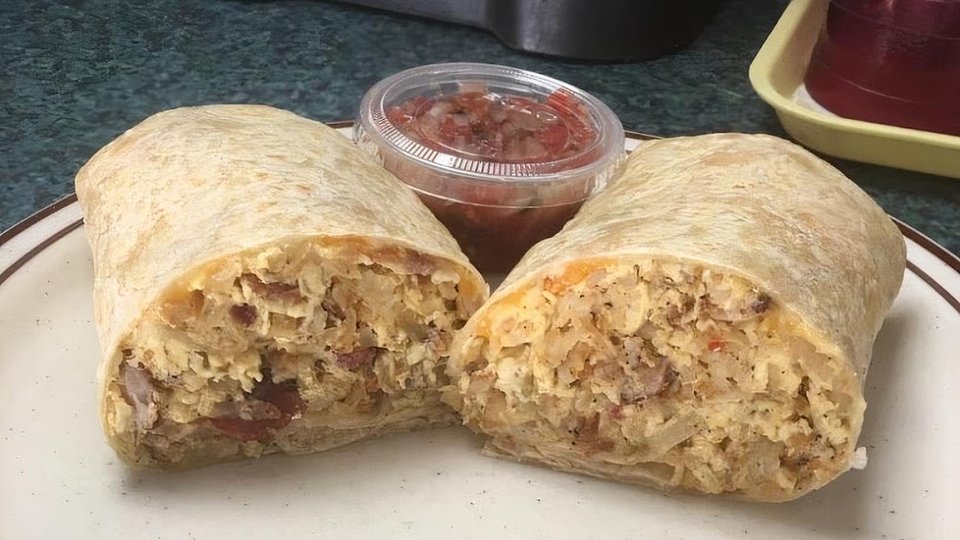 Printed specials list with eggs and sandwiches.