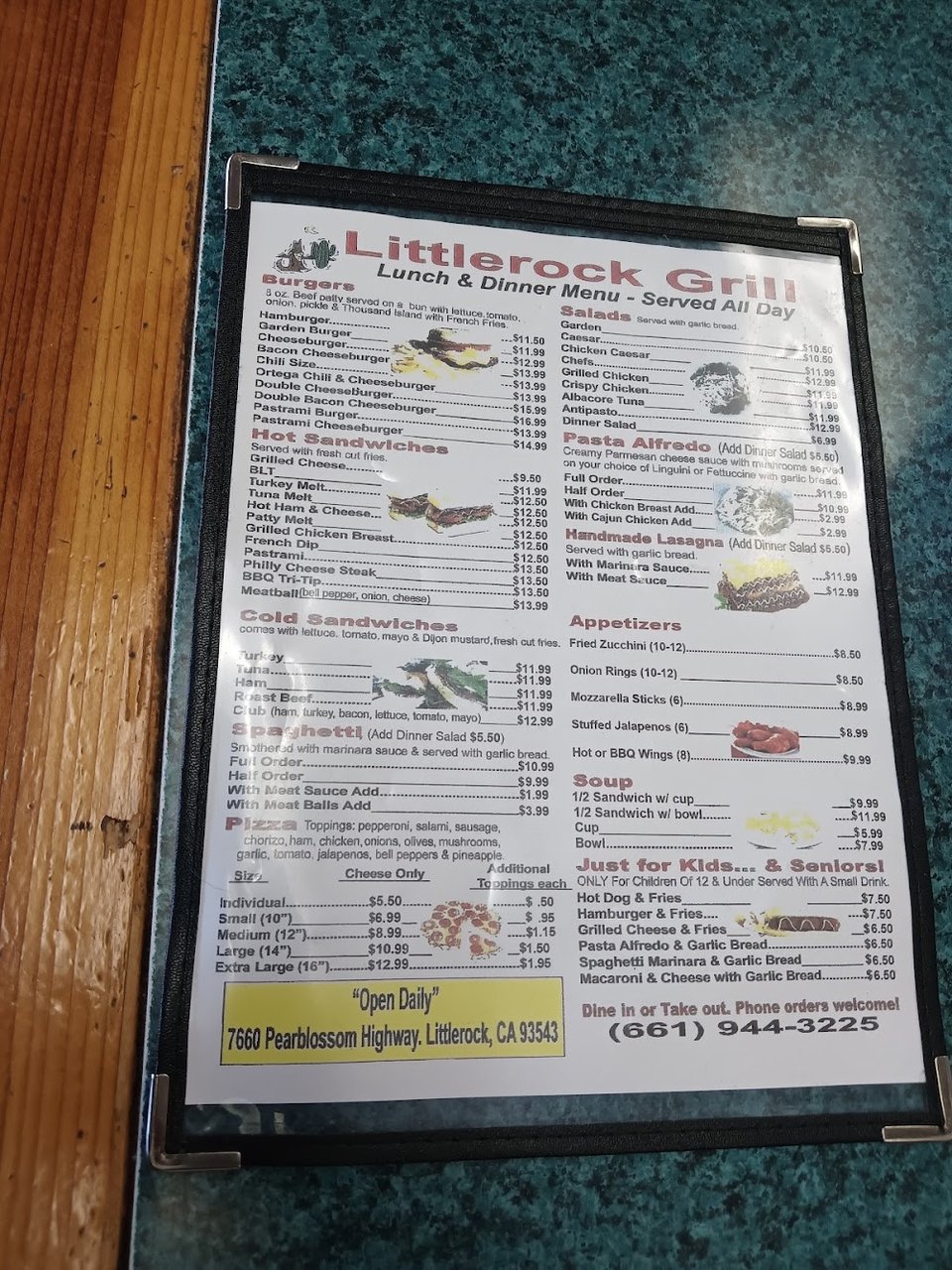 Printed specials list with eggs and sandwiches.